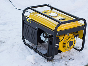 home generator running on a cold day sitting on snow